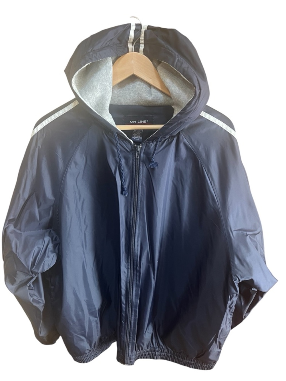 Vintage Navy Lightweight Hooded Windbreaker Jacket with Two White Stripe Trim.